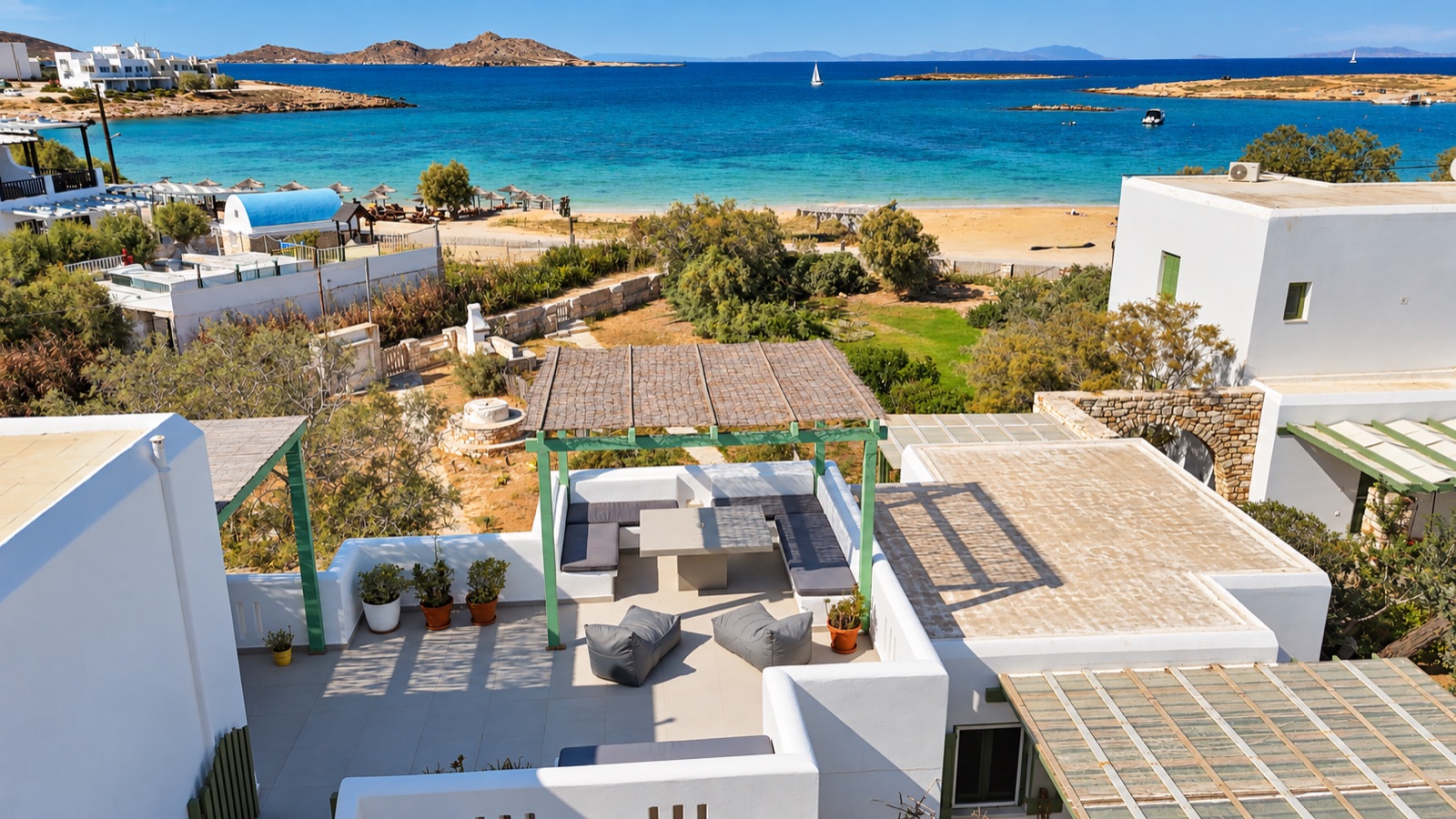 May Lola terrace from above with Agioi Anargyri beach immediately beyond